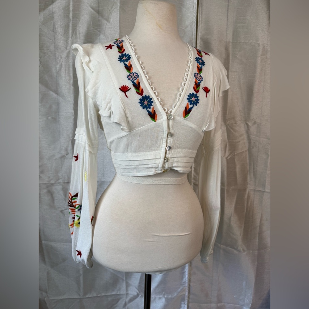 SHEIN White Ruffled Blouse with Red Embellishments